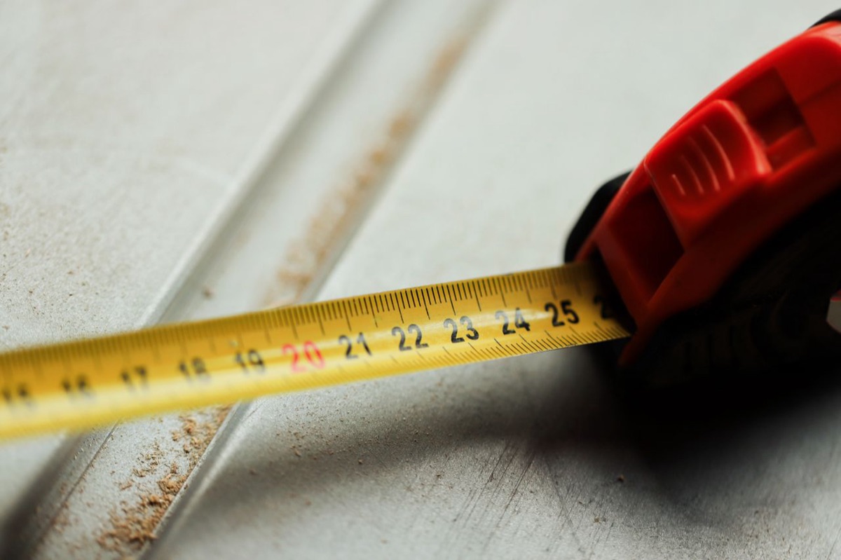 Close-up of a tape measure blade showing inch markings